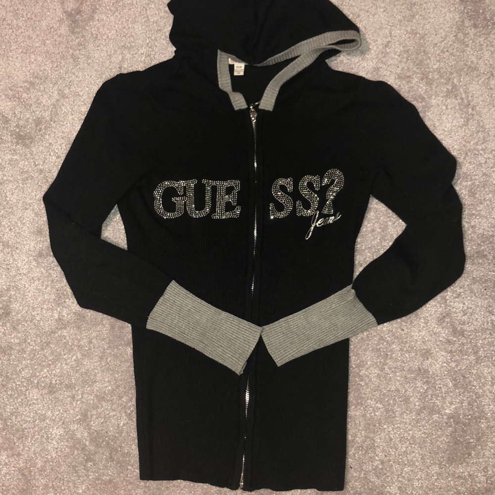 Black and grey Guess sweater.